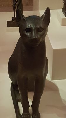 bastet waiting patiently in a berlin museum for the return of the pharaoh
